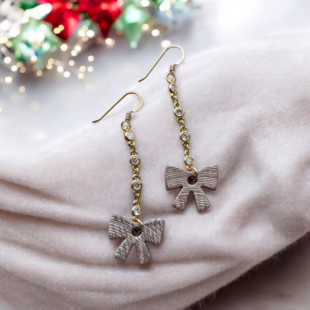 The Luxe Holly/ Sand Shimmer Tiny Bow Leather Earrings